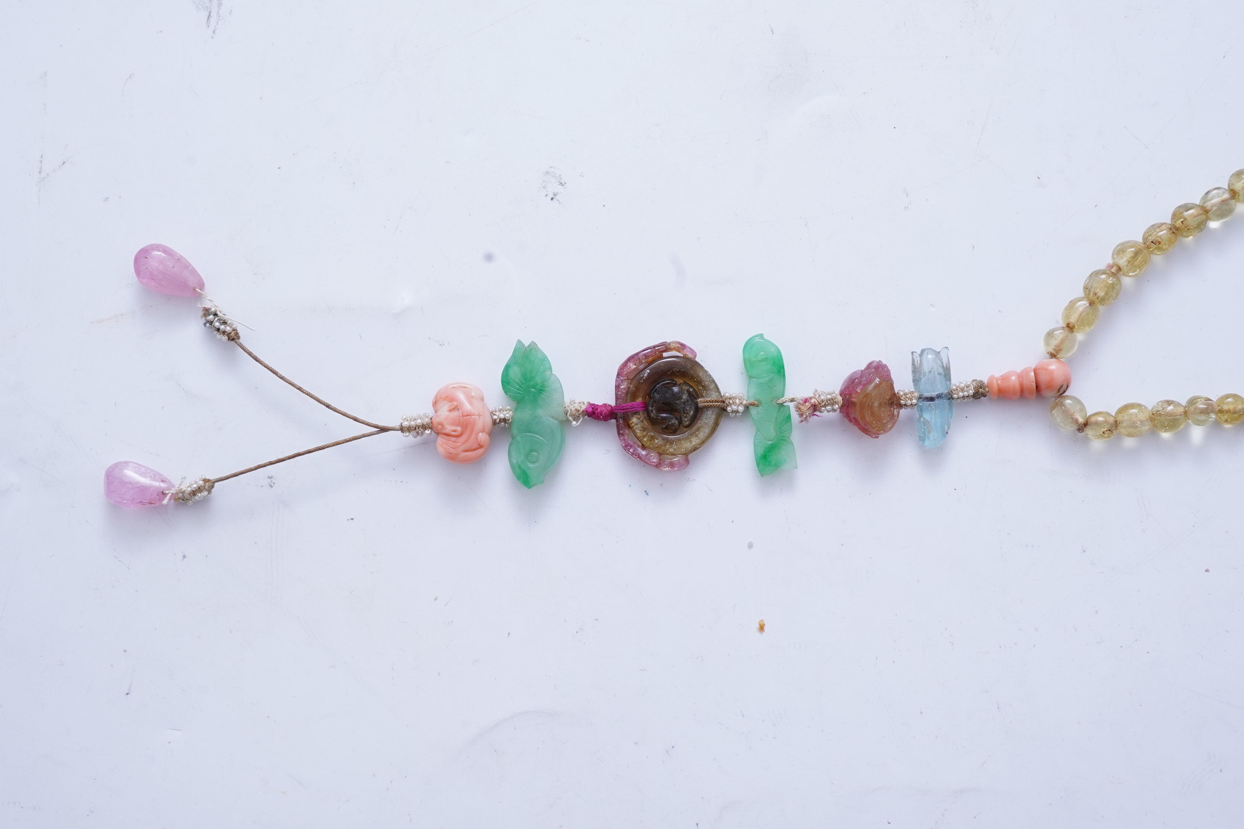 A multi-gem, coral and seed pearl necklace, China, early 20th century